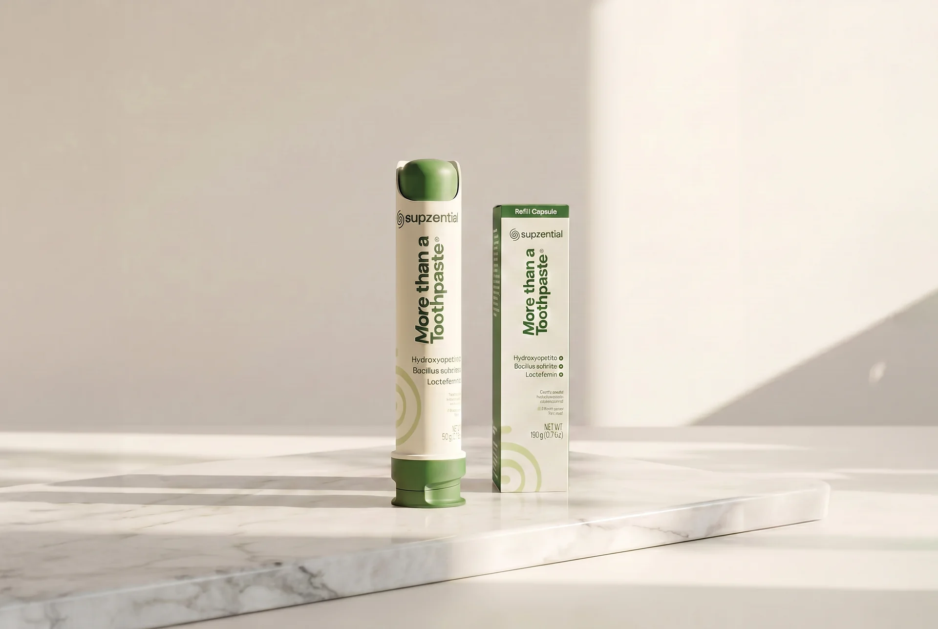 More Than a Toothpaste with refill capsule on a marble surface